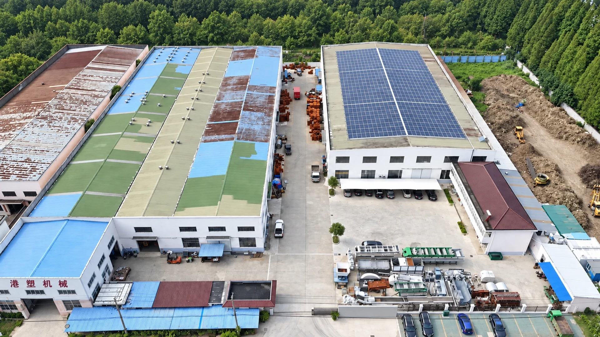 Aerial view of Gangsu Machinery factory buildings, solar-panel roof and outdoor recycling equipment